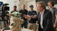 TIL Werner Herzog convinced Jon Favreau and Dave Filoni to keep Grogu as a puppet instead of CGI on the set of "The Mandalorian." After watching them shoot a take without the puppet to allow a CGI replacement in post-production, Herzog told them, "You are cowards. Leave it."
